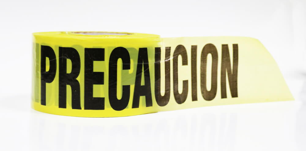 CINTA DELIMITADORA CON LEYENDA "PRECAUCIÓN" SR-1192 JYRSA